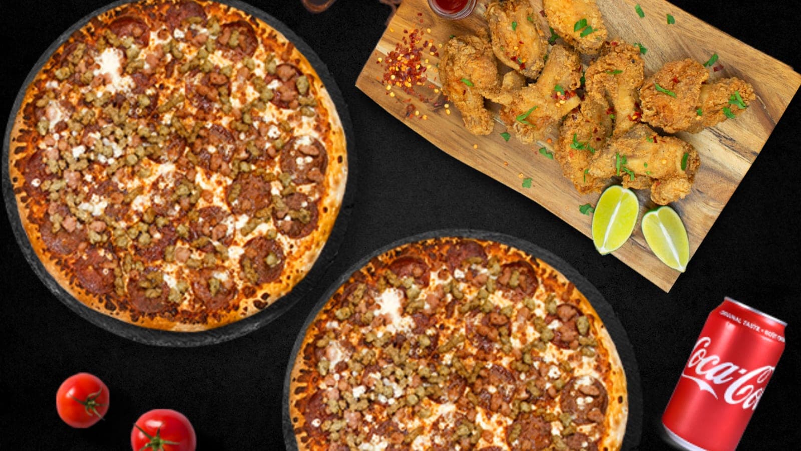 Two freshly baked Noni's pizzas with a board of wings and cold pop